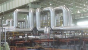 Curved metal industrial pipes